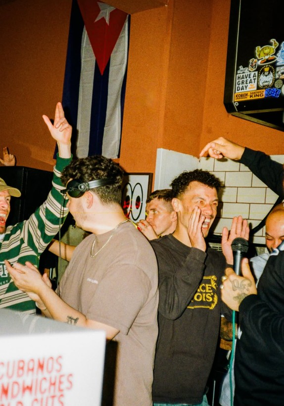 Crowd singing along at an Alfonso's event